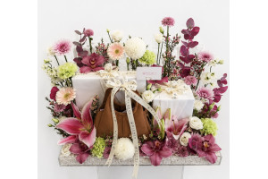 Acrylic bag arrangements with flowers